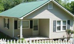 Excellent starter home or rental property minutes from Boone Lake and the airport. Newly remodeled bathroom, new windows, metal roof, and new rear deck. Call listing office for showing appointment, home currently being rented.