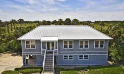 Private estate lot nestled between the Guana Preserve and the Atlantic Ocean. Indigenous plants make upkeep of the grounds a breeze. Architectural touches make this house one of a kind. This uniquely designed home has the living area upstairs with studio