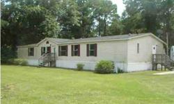 ** mobile home on small lot conveniently located to high growth areas of mt pleasant ** home sits way back on lot and the property line is directly behind the mobile home ** sale is as-is and is listed at lot value only ** no financing available ** age of
