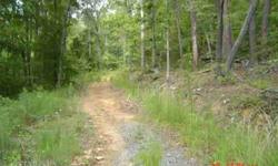 GREAT HUNTING LAND OR SPOT FOR HOME OR CABIN. 50 FT ROAD FRONTAGE STARTS AT HUGE BOULDER ON LEFT. BORDERS CHATTOOGA COUNTY.Listing originally posted at http