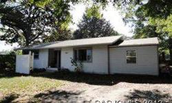 Cute 2 bedroom/1 bath ranch fixer that the current owner has started renovations. New roof 2010 & A/C 2007. More renovations needed. Large living room with brick wall, combination dining/kitchen area. Large family room with laminate wood floors, Original