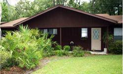 SHORT SALE. This home is in the wonderful Turkey Creek Forest Subdivision. Move in ready with a carport and Florida Room facing a wooded area, very peaceful and great for bird watching. Both bedrooms have walk-in closets and an indoor utility room. This