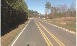 Beautiful residential development tract adjoining 12 Oaks Subdivision in Holly Springs. Property starts immediately south of entrance to 12 Oaks and consists of 13 +/- acres of mature pines and hardwoods. All utilities are available. Ready to develop. Non