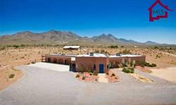 Set on 10 acres and located at the base of the Majestic Organ Mountains, this property could potentially be used for many different types of businesses, it is currently the Dreamcatcher Inn Bed and Breakfast. It features 3 guestrooms each having their own