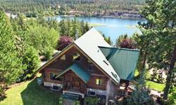 Spectacular Country Estate, offers a multitude of amenities. Log Home is yellow-pine scribed logs with the most amazing view of Fish Lake. This artfully crafted home offers whimsy at every turn with custom carvings, well thought out nooks and captured