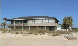 Spacious 5 bedroom home on the Gulf of Mexico at St. George Island. Home was upgraded in 2004 by the current owner. Fabulous rental history with repeat business. Large living areas on both floors and a large 2 car garage. Home is beautifully landscaped