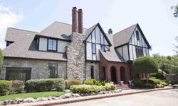 Timeless English Tudor. Beautiful woodwork, arched doorways, deep crown molding. Large formals, kitchen opens to family living area. Gameroom in basement. Large seperate quarters over garage. Pool and waterfall. Large corner lot.Listing originally posted