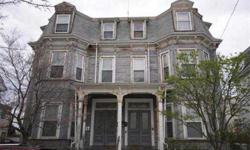 ATTENTION CONTRACTORS/INVESTORS *** Unique Opportunity to own this very sizable mansard style property with all of its period details and potential throughout. This multi-unit residence requires significant restoration but has had some fairly recent