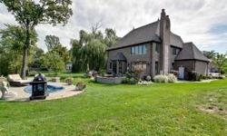 STUNNING 5BR/4.1BA FRENCH TUDOR STYLE HOME SITUATED ON PRIVATE CRNER LOT W/ BEAUTIFUL VIEWS OF FOREST PRESERVE LAKE! $1.2 MILLION TO BLD THE CUST HOME FEAT ELEGANT FINISHES & ARCHITECTURAL DETAIL T-OUT. INCLDNG 10FT CEILS, TURRETED/COFFERED/TRAY CEIL,