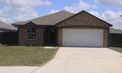 Lovely brick home with attached 2 car garage. Home equipped with tile floors in common areas and carpet in bedrooms. Spacious master suite with tub/shower combo in master bath. SUBMIT ALL OFFERS, SELLER EXTREMELY MOTIVATED!Listing originally posted at