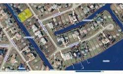 Canal front Residential building lot on the Santa Barbara canal in Harbour Heights, a non-deed restricted boat ramp community, just waiting for you to build your dream home. Direct access to the Peace River and the Gulf of Mexico! Great Location, all the