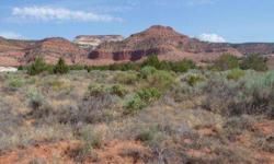 This is a great corner lot for your home or manufactured home. Horses & dogs are welcome in this subdivision, and you'll enjoy beautiful mountain views. Only 3 miles east of town. Located close to easy access to public land. Beautiful Lake Powell is only