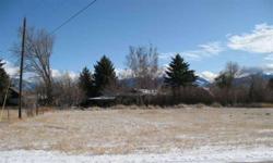 Premier, extra-large city lot in excellent neighborhood, near the madison river, just two blocks to river access and four blocks from downtown ennis.