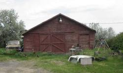 Single level 3 bedroom 1 bath surrounded by nice trees. 1.4 acres with irrigation. Nice 16x24 metal shop plus old milk barn and old wood grainery. The home is dated but in good condition and solid construction. Seller is repainting the home the first week