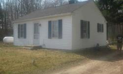 10.46 private acres mostly wooded, great for hunting or just enjoying nature. Smaller 2 bedroom, one bath home with newer roof and furnace. Exterior is vinyl. Cedar Springs schools, close to 131 expressway. 7 more family owned acres available for lease