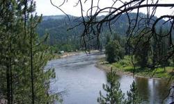 Beautiful level building site overlooking the majestic Kettle River with 1310 government line frontage. This 6.56 acre parcel affords numerous building sites, great year round access and spectacular 360 degree view. This property is surveyed and provides