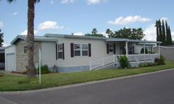Many upgrades and updates inside and out! So much home for the money. This 2/2/1 manufactured home on a corner lot features nearly 1,800 sq. ft. and has been recently remodeled to include a large family room and the kitchen & master bedroom have been
