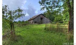 If Walls Could Talk. A Turn of the Century Mini Farm situated on over 13 acres. Includes a barn, several outbuildings, massive trees, and hay field. Energy efficient windows, and re plumbed in 2010. Being sold "AS is Where is" .............Truly a