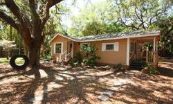 Looking for a peaceful location that is just minutes to Hwy 301 & I-75? If the answer is "yes" then this could be the house for you. Set on almost an acre w/towering oak trees & wildlife all around, you really will enjoy this secluded setting. This Jim