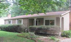 Move into your new home and not have to do anything. This home features new carpet, paint, vinyl flooring, Trane HVAC system(2009),gutters, countertops, and stove (2010). Wood burning fireplace. Sunroom off the living room and a tranquil wooded back yard