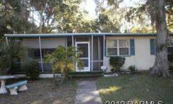 GREAT LOCATION CLOSE TO ANYTHING YOU NEED. VERY GOOD CONDITION IN GENERAL, GOOD LOOKING KITCHEN, FLORIDA ROOM WITH INSIDE UTILITY CLOSETS FOR FULL SIZE WASHER AND DRYER. OVER SIZED ONE CAR GARAGE AROUND BACK. VERY UNIQUE THE PROPERTY HAS A GRASS DRIVEWAY