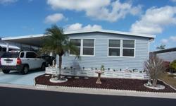 2 Bedroom/2 Bath Mobile Home is located in an amazing gated community - Furnished Double Wide - $79,900 This home features a beautiful enclosed Lanai great for entertaining. Has a large master bedroom with attached bath. The second bath has a wonderful
