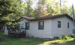 Well maintained 3 bedroom, 2 bath home on 10 beautiful wooded acres. Great hunting property! 30x40 pole barn, concrete flooring, 100 amp service with 220 available. You'll love the finished, insulated work shop area or man cave inside the pole barn, which