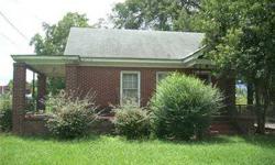 Brick home with hardwood floors. Zoned for office use but most recently used as rental property.Listing originally posted at http