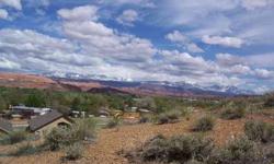 This beautiful lot sits high on the hill at the end of a cul-de-sac in town. From this .31 acre lot, the views can't get any better. You will love overlooking the town and the whole Moab valley. If you want even more space you could make an offer on lots