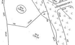 Building lot, 1.49 Acre lot that sits up from the road. Great opportunity to build your home in convenient location. Wooded site.
Listing originally posted at http