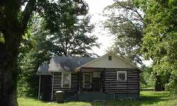 Great deal!! Priced $15,000 below an appraisal that was done two years ago. Log home built in 1932 has been almost totally rewired and replumbed. There is another room that could be used as a 3rd BR but has no closet. There is also a small laundry room.