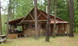 Fantastic Secluded Cabin. Looking for privacy? 24.44 acres. Almost Off The Grid. Seasonal pond. Lots of trees. Quaint cabin, Barn & storage building. 1 main bedroom plus 2 loft bedrooms, 1 bath. 3 miles of primitive road. Power on property. Spring water.