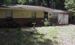 REDUCED (From $96,599)--Lots of potential abound, for this CB/Stucco-built home, on a wooded/gated one-acre tract, located with paved frontage along SR-26 in-between Trenton & Fanning Springs. This is an estate sale, with all property/contents-staying are