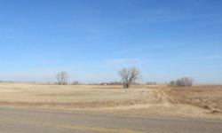 Location gives this choice piece of property so many options! It has half mile frontage on hwy 83 and 62nd ave The front half facing hwy 83 is zoned C2 the back half is AG. The ditch along hwy 83 has some utilities. At a $1.12 a sq ft this is a steal.