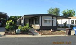 Offering a 2 bedroom /2 bath mobile home in the beautiful Kings River Mobile Park in Reedley. This is a gated senior park next to Reedley beach. Great Landscaping all around. Has a very nice park area with barbecue pits and great swimming pool to enjoy