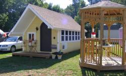 12X24 outside dimensions / 10X20 inside dimensions. Portable Cottage with 4' overhang porch, detachable deck porch, Pella insulated windows, storybook cut door, full electrical and insulation inside. Partial paneling inside, ceiling fan, lights. Have sold