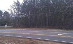 Almost 2 acres of commercial property at the intersection of Hwy 81 and Walnut Grove Parkway. This intersection has a traffic count of approximately 22,000 per day. There is a potential sewer available. This is a great location for a restaurant, large