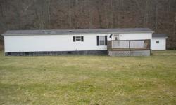 1998 Holly Park Mobile Home 14X70 2BDR, 2BA, excellent condition, new hardwood floors throughout, new paint, city water, also has well water outside, gasWith 13.5 acres 24X32 finished and insulated garage12X20 outbuilding