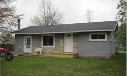 Loaded with updates, newer windows, roof, furnace, patio door and a new garage.