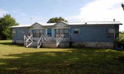 Waterfront and an airstrip! What more could you ask for! Spacious 3 bedroom, 2 bath home is perfect for a family retreat! Home features 2 dining rooms, an eat in kitchen, large family room and huge screened porch. With a little TLC this could be a great