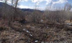 Beautiful lot in Little River Ranch. Lot borders open space. Lots of vegetation. Bring your plans.