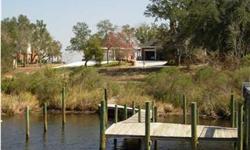 This is a large and protected waterfront lot in the exclusive gated community of Shalimar Pointe. The location allows for a short boat ride to Crab Island and Destin Pass. However you are on a protected bayou. This is one of the last deep protected
