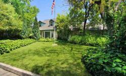 Located in a wonderful neighborhood, the striking curb appeal of this 4 bed, 2.5 bath home immediately draws attention. Manicured grounds of lush greenery create a picture-postcard image while providing a blanket of privacy. Inside this pristine home,
