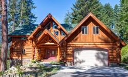 Custom built luxury log home overlooking Lake Wenatchee with stunning mountain views. Entertain in the sun filled great room or sprawl out on the lake view deck. Gorgeous kitchen will delight every chef and you'll play the perfect host with three bedroom