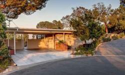 A post and beam mid-century modern by noted Pasadena architect Theodore Pletsch, nestled on a secluded San Rafael hillside cul-de-sac, features a spectacular view of Pasadena and the San Gabriel mountains. First time on the market in over 30 years, this