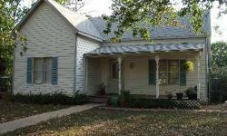 Older 2/1 home on two lots in nice neighborhood. Most of the home is original, but important updates have been made