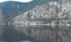 Unobstructed fabulous Lake Chelan view on this large lot on a quiet dead end street just North of Manson. 3/4 of an acre of privacy for your vacation or year around home with domestic water. Priced to sell with seller owner financing terms. Borders