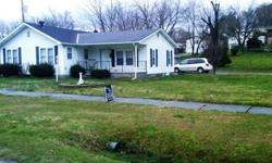 #2488 - Middlesboro, KY - This home is as cute as can be with 2 bedrooms and one bathroom (one bedroom is extra large); living room 24 x 24; eat-kitchen, dining room; laundry room; hardwood floors; nice level yard; central heat and air; double lot; city