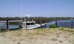Waterfront property with magnificient view for sale on Maryland's Eastern Shore. Excellent location to dock your fishing boat. Bulkheaded approx. 48 feet. Access to Chesapeake Bay. Formerly used as crab shedding operation. Priced to sell at $83,900.00.