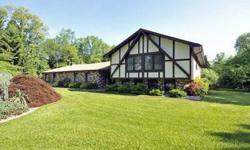 HORSE OWNER'S DREAM! Gentleman's equestrian 6.5 acre farm. 10 stall barn, feed rm, heated tack rm w/ 1/2 bath, hay loft. Easy maintenance, heated Nelson waterers, lifetime vinyl fencing, paddocks w/run ins, riding ring. Personal trails out back, 1/2 mi to